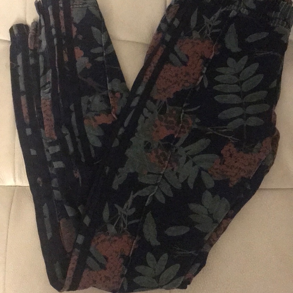 Floral Adidas sweatpants.
